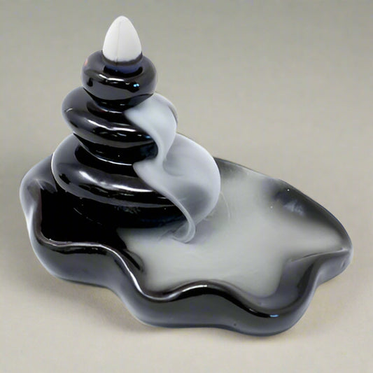 Pebbles Into Pool Backflow Burner