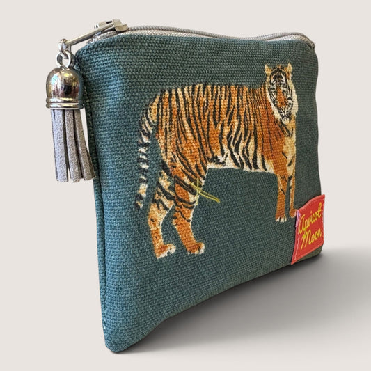 Tiger Tiger purse with a grey zip and grey suede tassel, angled view showing the Apricot Moon label