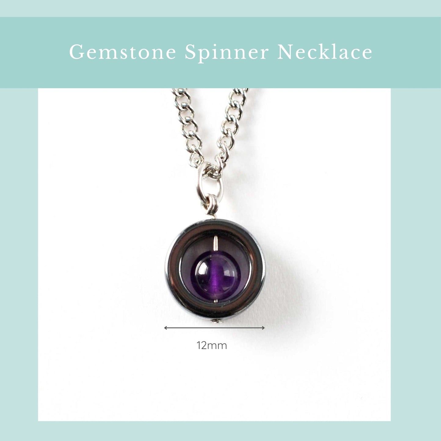 Gemstone spinner necklace with purple gemstone on a white background