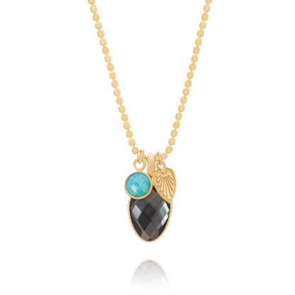 Necklace with a pendant featuring two stones on a white background