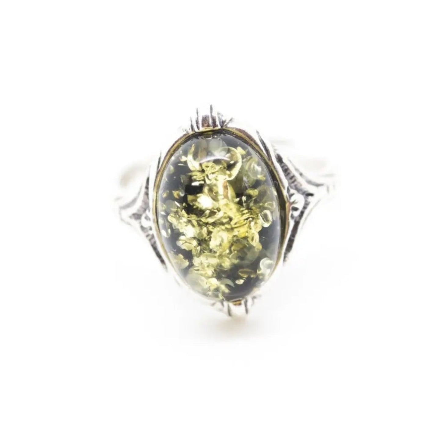Ring with a large amber stone and silver band on a white background
