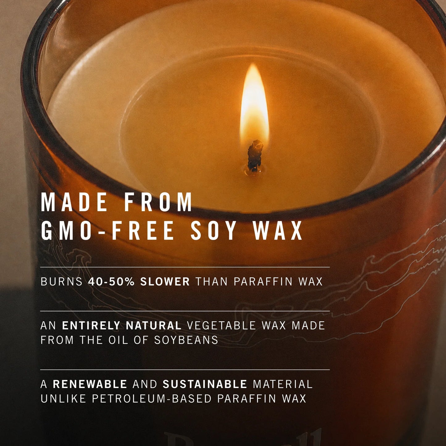 Candle with text about GMO-free soy wax