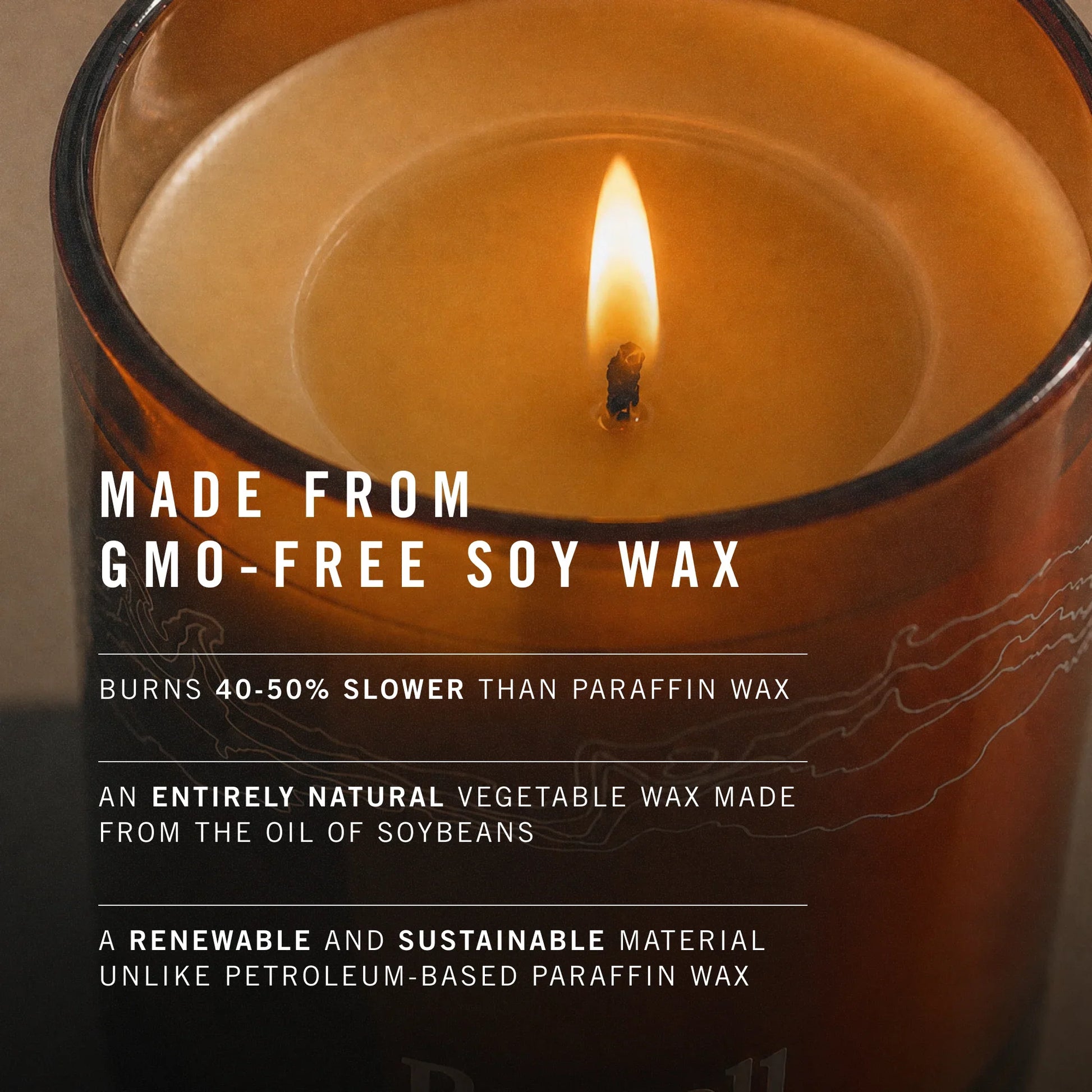Candle with text about GMO-free soy wax