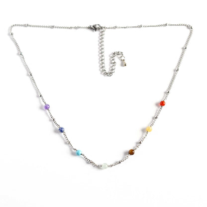 Necklace with colorful beads on a white background