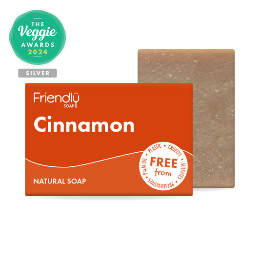 Cinnamon soap bar with packaging and 'Friendly Soap' branding on a white background.