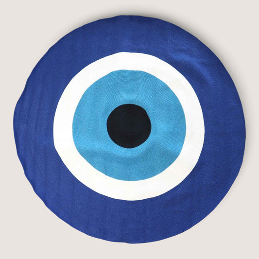 Round Cotton Rope Evil Eye Rug in royal blue, white, turquoise and black, seen from above