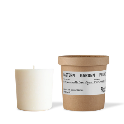 Candle and its packaging with 'Eastern Garden' branding on a white background