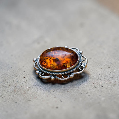 Oval Classic Framed Amber Brooch