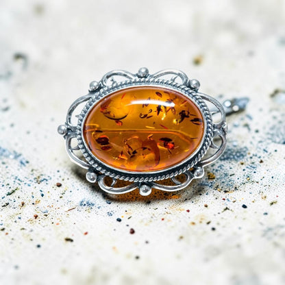 Oval Classic Framed Amber Brooch
