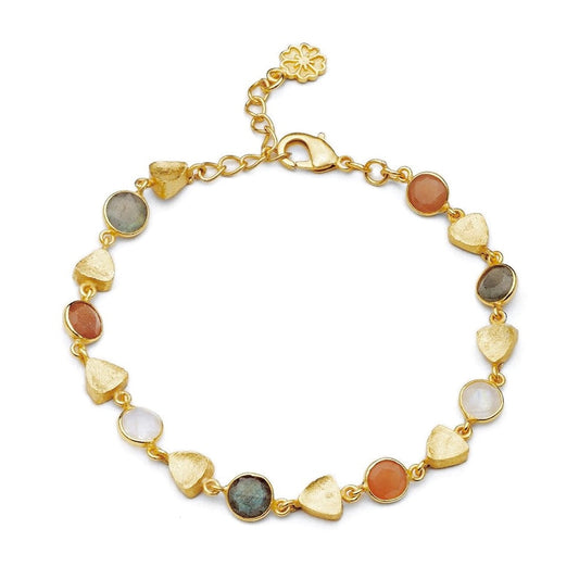Gold bracelet with multicolored stones on a white background