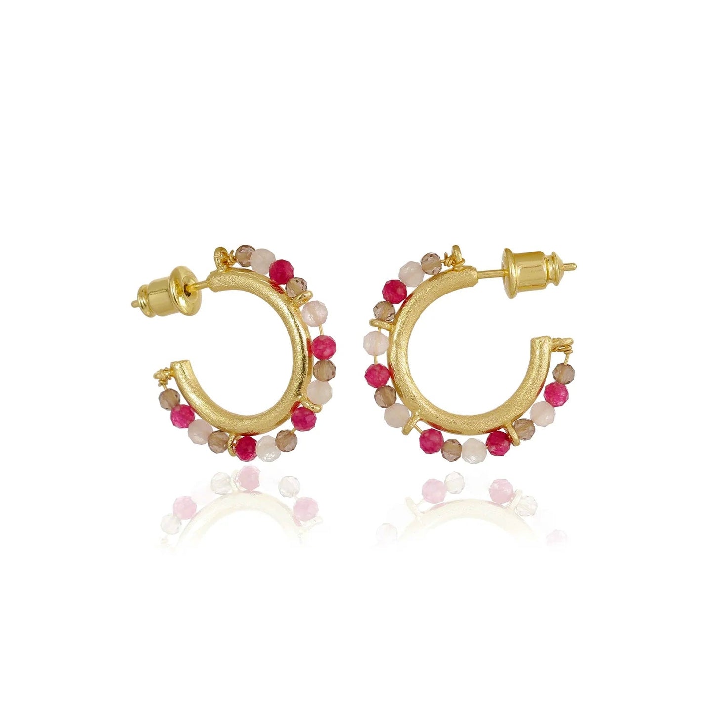 Gold hoop earrings with pink and red beads on a white background