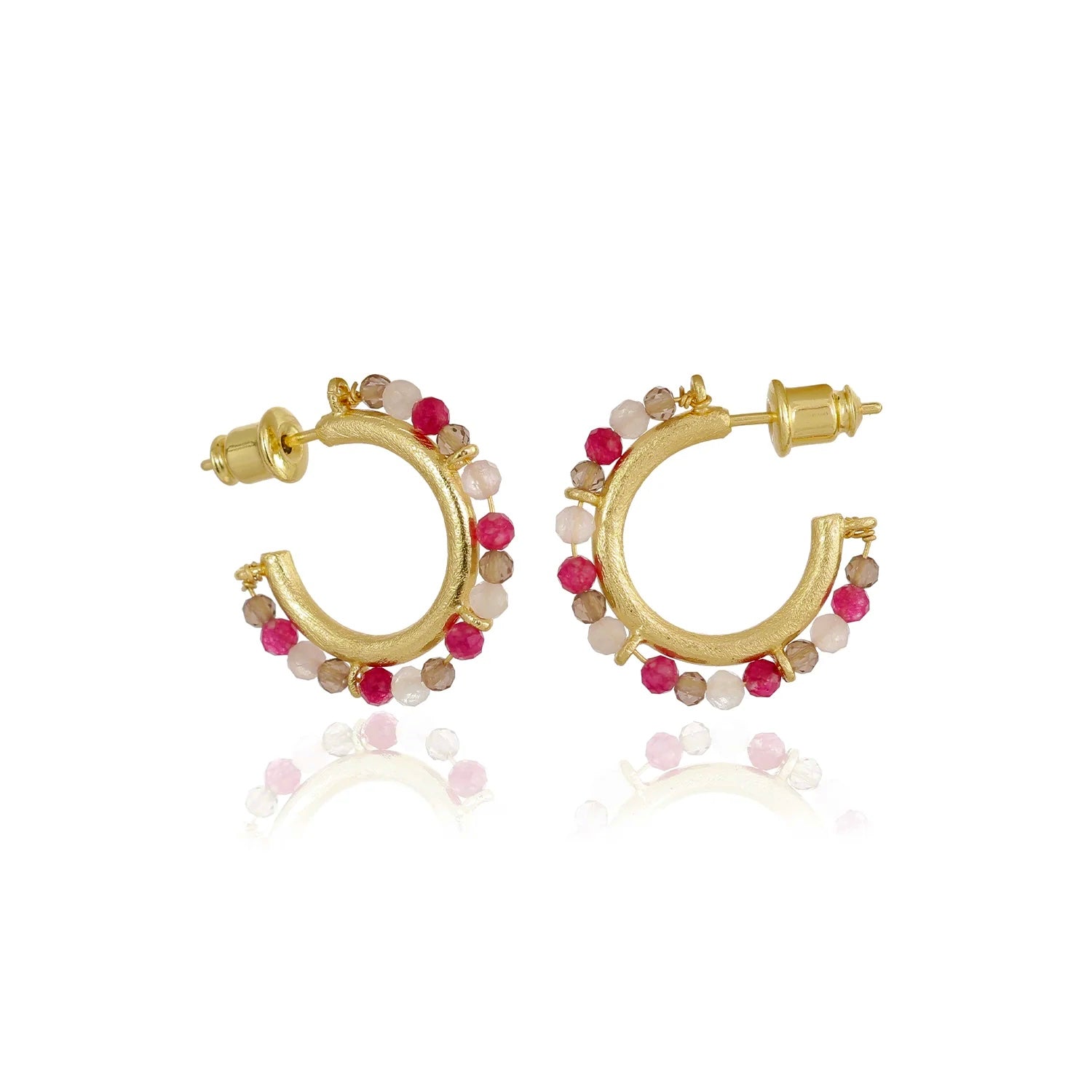 Gold hoop earrings with pink and red beads on a white background