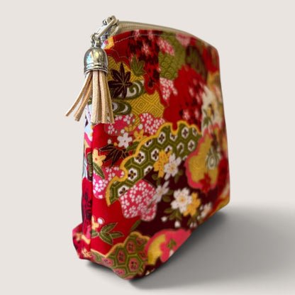 End view of the Isumi Red Japanese everyday pouch showing the Apricot Moon label