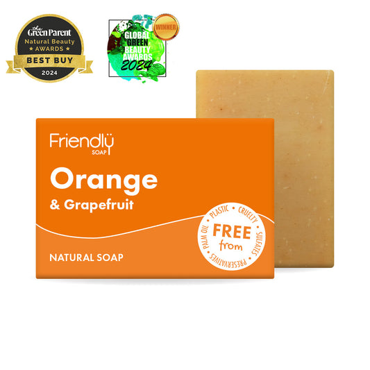 Orange and Grapefruit natural soap bar with packaging on a white background