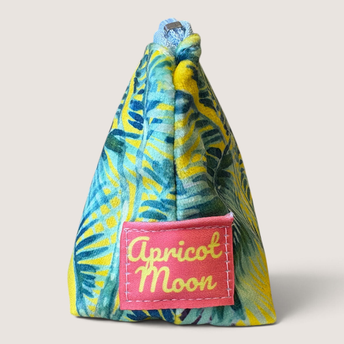 End view of the Palm Springs velvet pencil case showing the Apricot Moon label