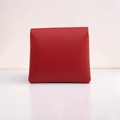 Red rectangular pouch on a white background