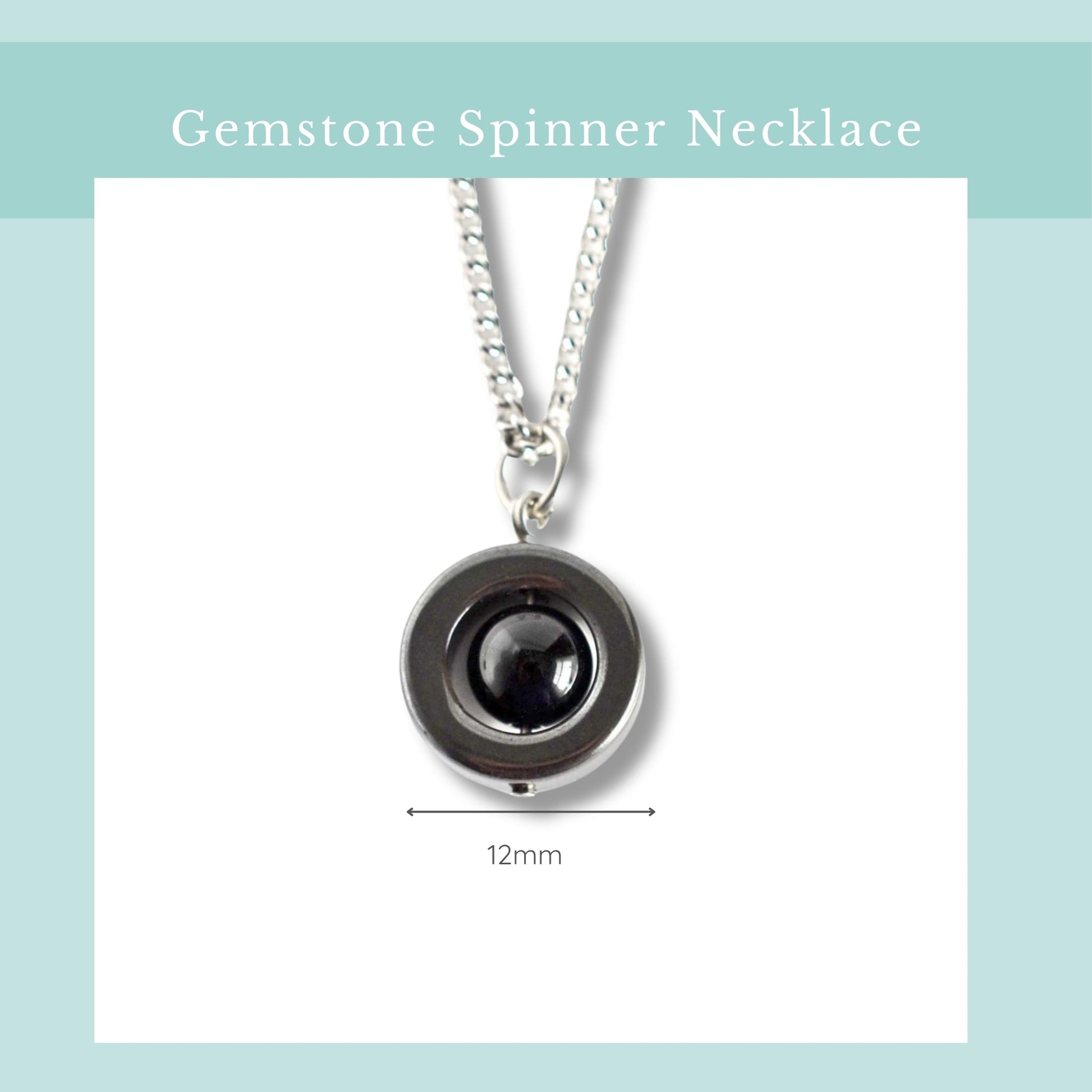 Gemstone spinner necklace with a black gemstone on a white background