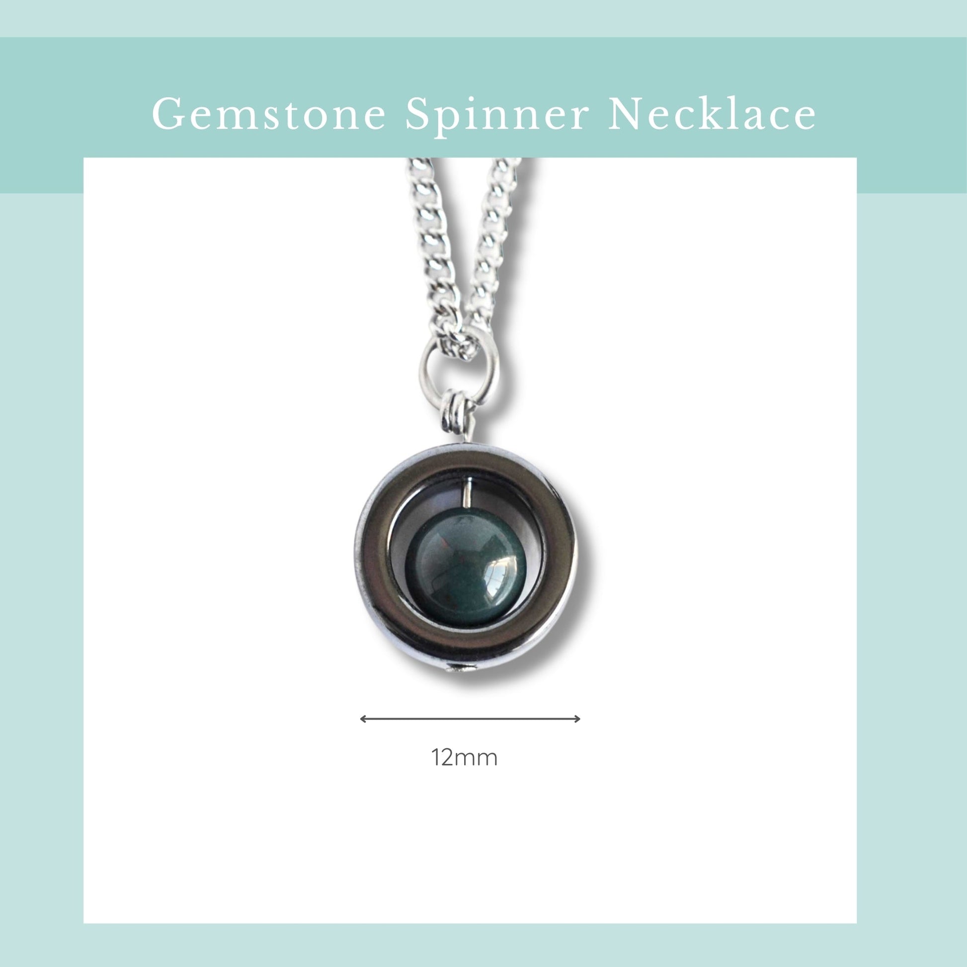 Gemstone spinner necklace with a blue gemstone on a light blue background
