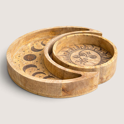 Sun and Moon wooden tray set nested together, angled view showing the carved moon phases and sun and moon face