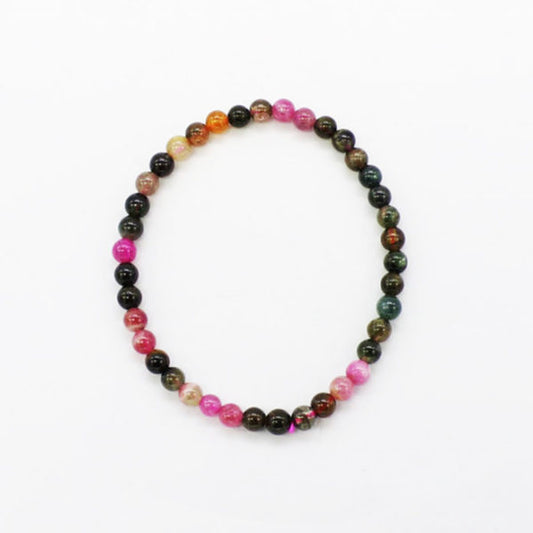 Multicolored beaded bracelet on a white background