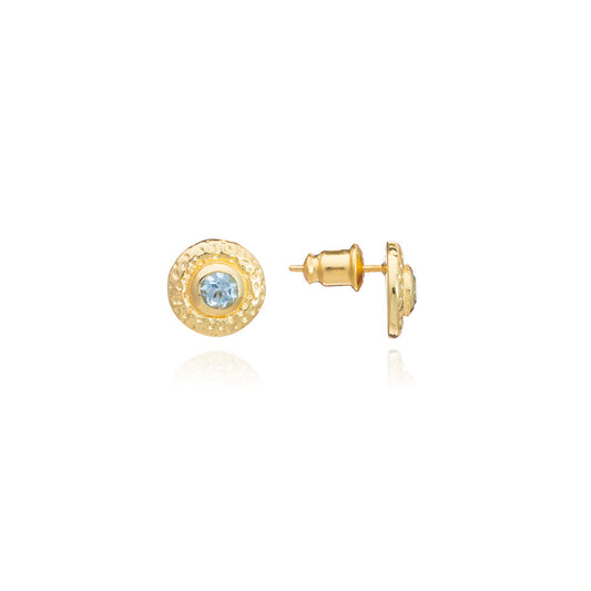 Gold earrings with a central gemstone on a white background