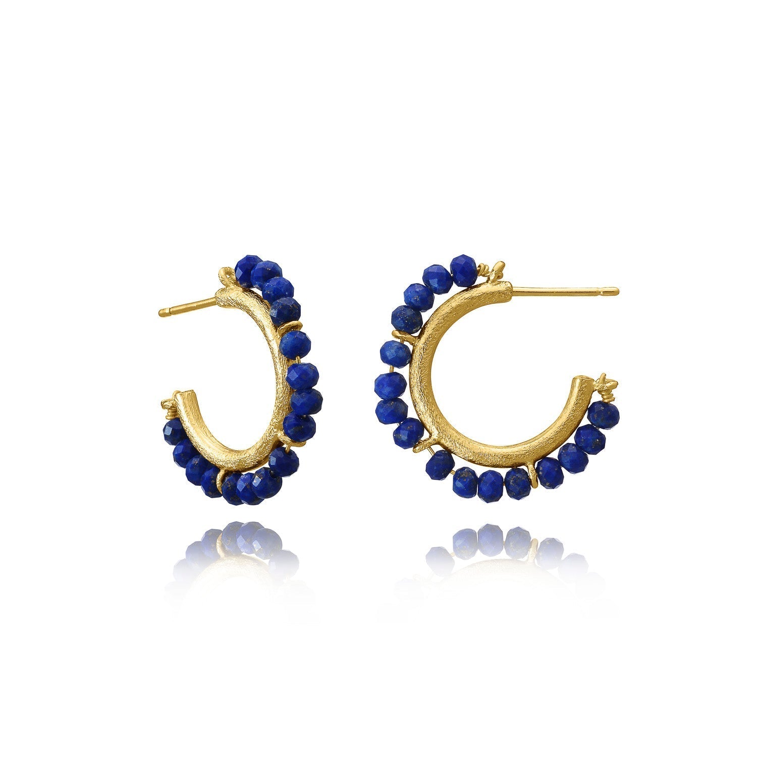 Gold hoop earrings with blue beads on a white background