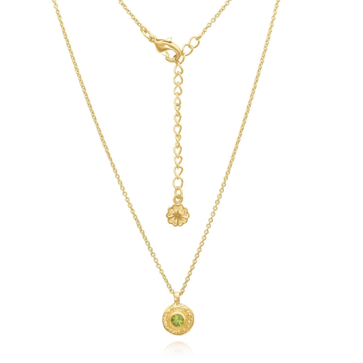 Gold necklace with a green gemstone pendant on a white background