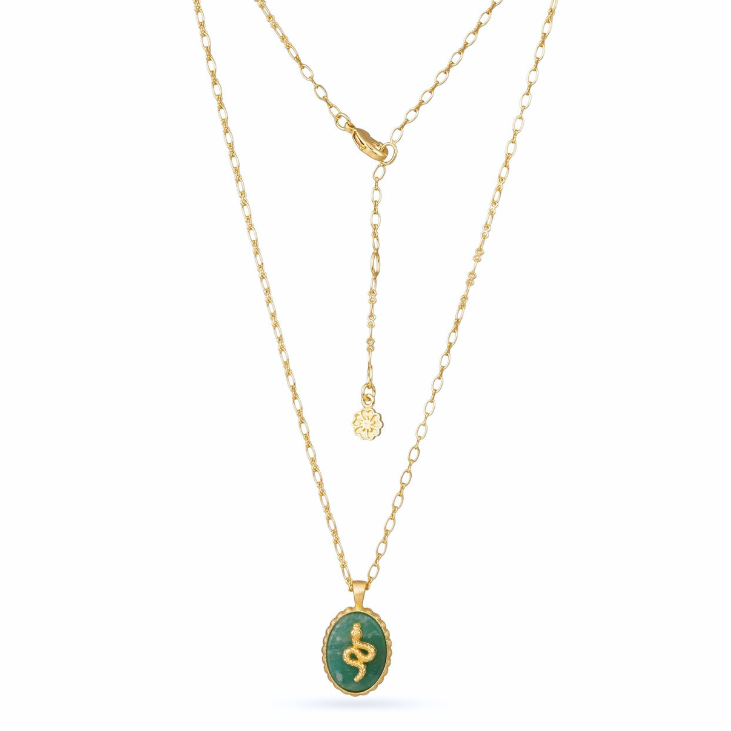 Gold necklace with a green pendant on a white background